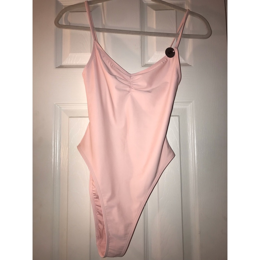 Pink bathing suit. Brand new , never worn